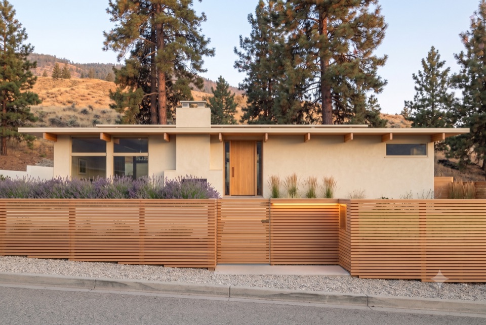 Cedar slats, lit entry nook.