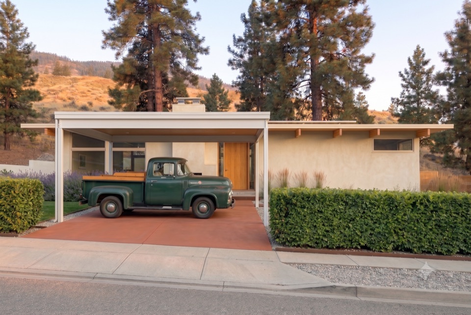 Carport forward, green pickup.