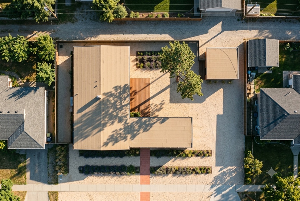 A typical 40 foot lot, straight down. House plus laneway suite, private court between them, no lawn.